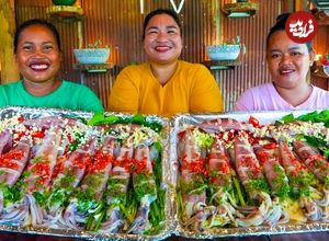 ببینید| غذای روستایی در سنگاپور؛ پخت ماهی مرکب در خاک رس و کاه