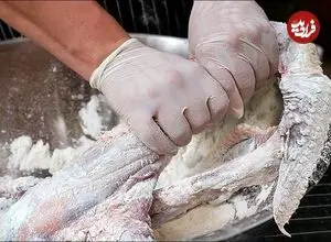 ببینید| غذای خیابانی در تایلند؛ بال شتر مرغ سرخ شده در بانکوک