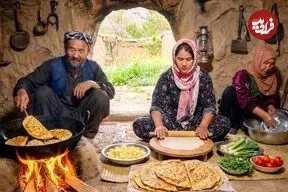 ببینید| غذای روستایی در افغانستان؛ پخت بولانی با سیب زمینی توسط خانواده افغان
