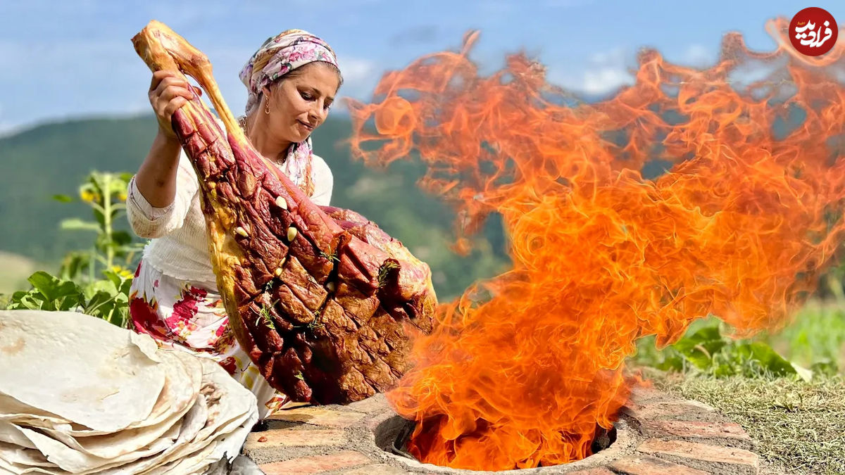 (ویدئو) کباب کردن ران بزرگ گاو در تنور به روش دوبانوی روستایی گیلانی 