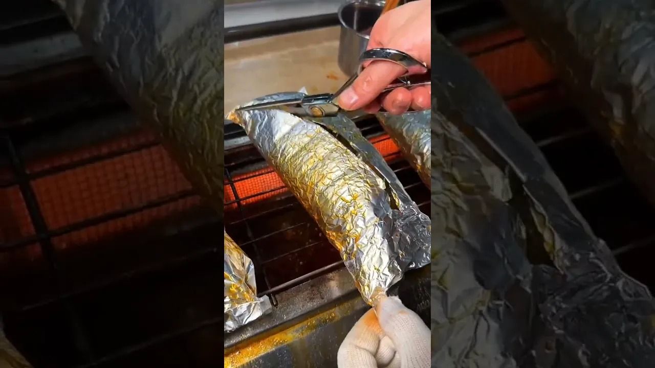 (ویدئو) روش باورنکردنی یک رستوران مشهور چینی برای پخت ماهی!
