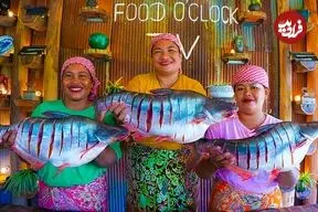 ببینید| غذای روستایی در سنگاپور؛ پخت ماهی شکم پر به روشی متفاوت در طبیعت روستا