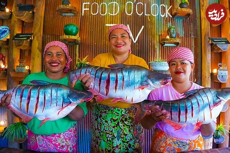 ببینید| غذای روستایی در سنگاپور؛ پخت ماهی شکم پر به روشی متفاوت در طبیعت روستا