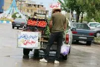 (عکس) سفر به تهران قدیم؛ پرتقال فروش دوره گرد با گاری اش در سال  1355