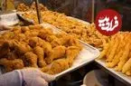 ببینید| غذای خیابانی در کره؛ پخت مرغ و میگوی سوخاری در سئول