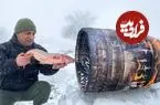 ببینید| غذای روستایی در آذربایجان؛ کباب کردن ماهی کپور در بشکه و در برف 