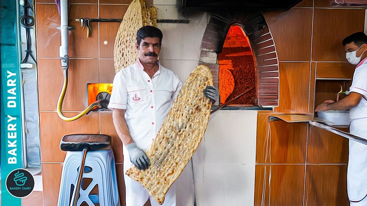 (ویدئو) ببینید نانوایی های ایرانی چگونه نان سنگک سنتی را آماده می کنند