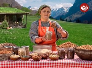 ببینید| غذای روستایی در آذربایجان؛ تهیه کره بادام زمینی به روش سنتی