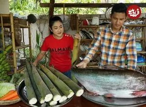 ببینید| غذای روستایی در چین؛ پخت یک غذای سنتی با ماهی رودخانه ای، بامبو و آناناس