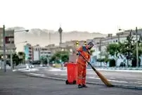 عکس| سفر زمان؛ رفتگران در حال کار کردن با پای برهنه در تهران؛ دهه 30