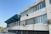 عکس| ایران قدیم؛ نمایی از «ساختمان کارخانه کانادا درای» در تهران؛ اواخر دهه 30