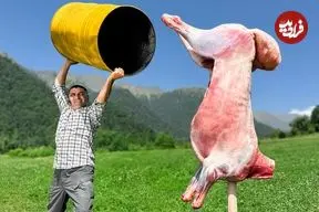 ببینید| غذای روستایی در آذربایجان؛ کباب کردن بره در بشکه و در طبیعت