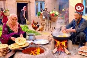 ببینید| غذای روستایی در افغانستان؛ پخت نان در تنور و تهیه املت سنتی