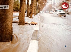 (عکس) سفر به تهران قدیم؛ بالا آمدن آب خیابان‌های تهران را بهم ریخت!