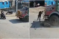 ببینید| نجات معجزه‌آسای دختر موتورسوار پس از تصادف با کامیون