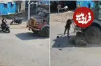 ببینید| نجات معجزه‌آسای دختر موتورسوار پس از تصادف با کامیون