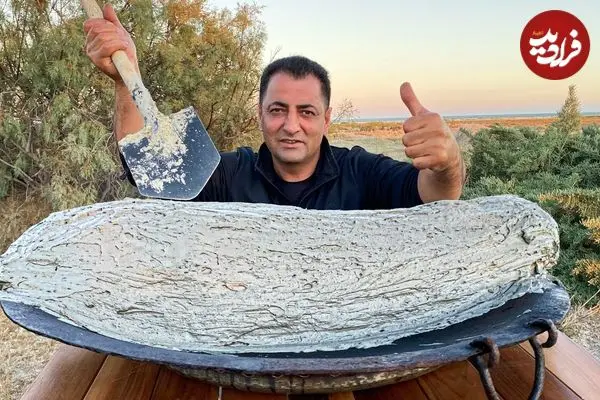 ببینید| غذای روستایی در آذربایجان؛ کباب کردن ماهی کپور با گِل و در آتش