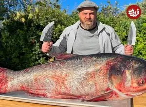 ببینید| غذای روستایی در آذربایجان؛ کباب ماهی بزرگ شکم پر در میان نمک و در تنور