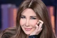 عکس بامزه و کریسمسی نانسی عجرم و دخترانش