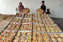ببینید؛ غذای روستایی در هند؛ پخت 99 عدد پیتزا در تنورخانگی
