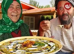 ببینید| غذای روستایی در افغانستان؛ پخت آش رشته سنتی توسط زوج مسن افغان