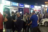 تصاویر/ هجوم مردم ترکیه به خودپردازها بعد از کودتا