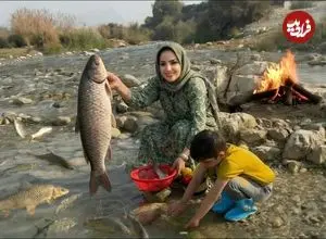 ببینید| غذای روستایی در ایران؛ کباب کردن ماهی در کنار رودخانه
