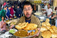 (ویدئو) غذای خیابانی در هند؛ پخت چوله باتوره در دهلی نو 