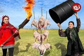 ببینید| غذای روستایی در اوکراین؛ کباب مرغ کامل در بشکه