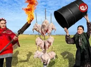 ببینید| غذای روستایی در اوکراین؛ کباب مرغ کامل در بشکه