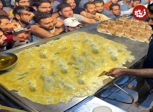 ببینید| غذای خیابانی در هند؛ تهیه برگر با تخم مرغ در بمبئی