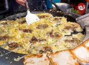 ببینید| غذای خیابانی در تایوان؛ تهیه پنکیک صدف و تخم مرغ در تایپه