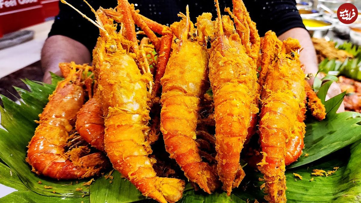 ببینید؛ غذای خیابانی در کره؛ میگوی سوخاری، مارماهی کبابی و مرغ سرخ شده در سئول