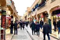 عکس| سفر به تهران قدیم؛ کاروان شترها در حال رد شدن از کوچه مروی؛ دهه 40