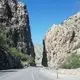 عکس| سفر به ایران قدیم؛ یک کاروان در جادۀ کوهستانی بوشهر به شیراز؛ 136 سال قبل