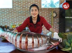 ببینید| غذای روستایی در چین؛ پخت غذا با ماهی بزرگ رودخانه ای و آناناس به سبک سنتی