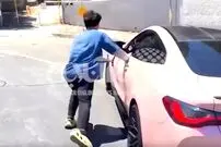 (ویدئو) شیرین کاری یک بلاگر که BMW صورتی‌اش را نابود کرد!