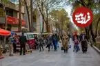 عکس| سفر به ایران قدیم؛ «دختر چادر صورتی» در یکی از خیابان‌های تهران؛ سال 1346