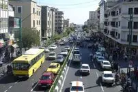 عکس| سفر زمان؛ خر با بار نمک در یکی از خیابان‌های تهران؛ سال 56