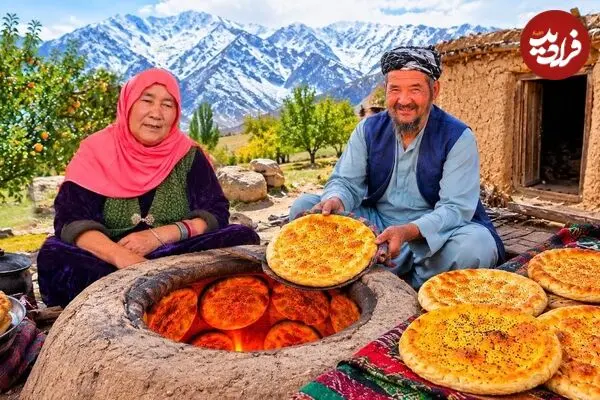 ببینید| غذای روستایی در افغانستان؛ پخت نان فطیر سنتی توسط زوج مسن افغان
