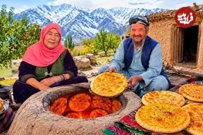 ببینید| غذای روستایی در افغانستان؛ پخت نان فطیر سنتی توسط زوج مسن افغان