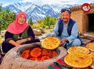 ببینید| غذای روستایی در افغانستان؛ پخت نان فطیر سنتی توسط زوج مسن افغان
