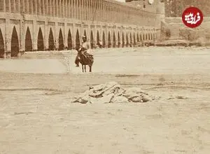 عکس| سفر زمان؛ یک مرد اصفهانی سوار بر الاغ در کنار سی و سه پل؛ 135 سال قبل