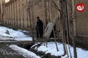 عکس| سفر به تهران قدیم؛ تصویر رنگی‌شده از یک خیابان برفی در تهران عهد قاجار