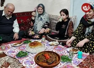 ببینید| غذای روستایی در ایران؛ پخت خوراک بادمجان در هوای برفی روستا