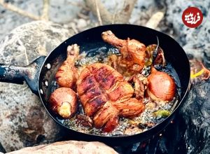 (ویدئو) غذای روستایی در بنگلادش؛ نحوه پخت متفاوت یک مرغ کامل در جنگل