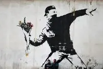 رویترز: هویت واقعی «بنکسی» هنرمند ناشناس مشهور فاش شد / پایان یک راز سی‌ ساله