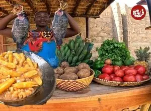 ببینید| غذای روستایی در کنیا؛ پخت پاستا با موز کال در روستا