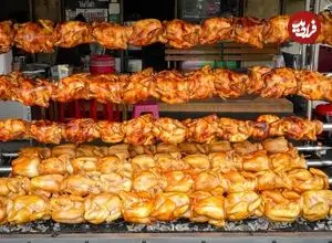 ببینید| غذای خیابانی در تایلند؛ کباب 300 مرغ کامل روی آتش در بانکوک