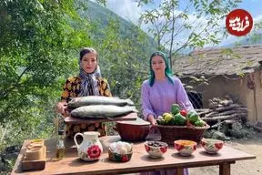 ببینید| غذای روستایی در ایران؛ تهیه غذا با ماهی قزل آلا و میوه خشک